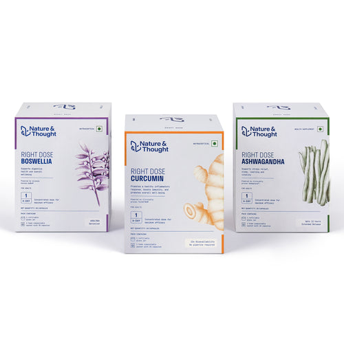 [First] Three boxes of 'Nature & Thought' supplements on a white background