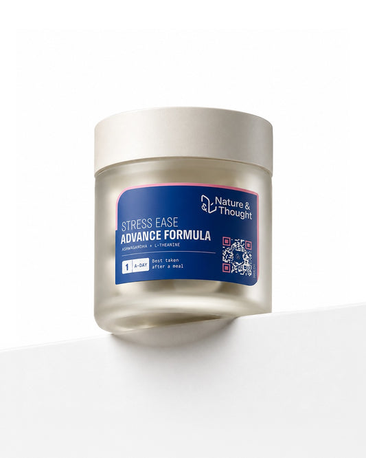 A jar of Nature & Thought Stress Ease Advance Formula, featuring a frosted glass container with a white lid and a blue label, set against a clean white background.